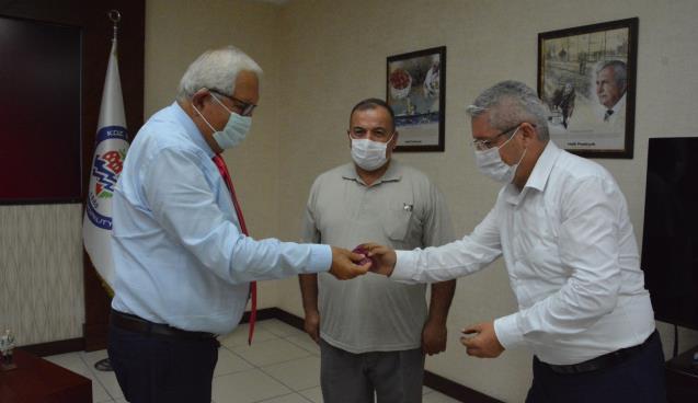 POSBIYIK, EMEKLİ PERSONELE ALTIN HEDİYE ETTİ