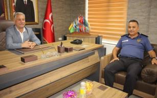 Kuyu’dan MHP’ye iade-i ziyaret…