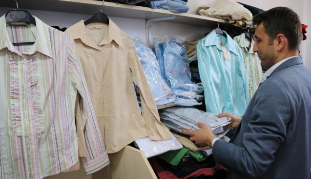 325 AİLEYE KIYAFET YARDIMI YAPILDI